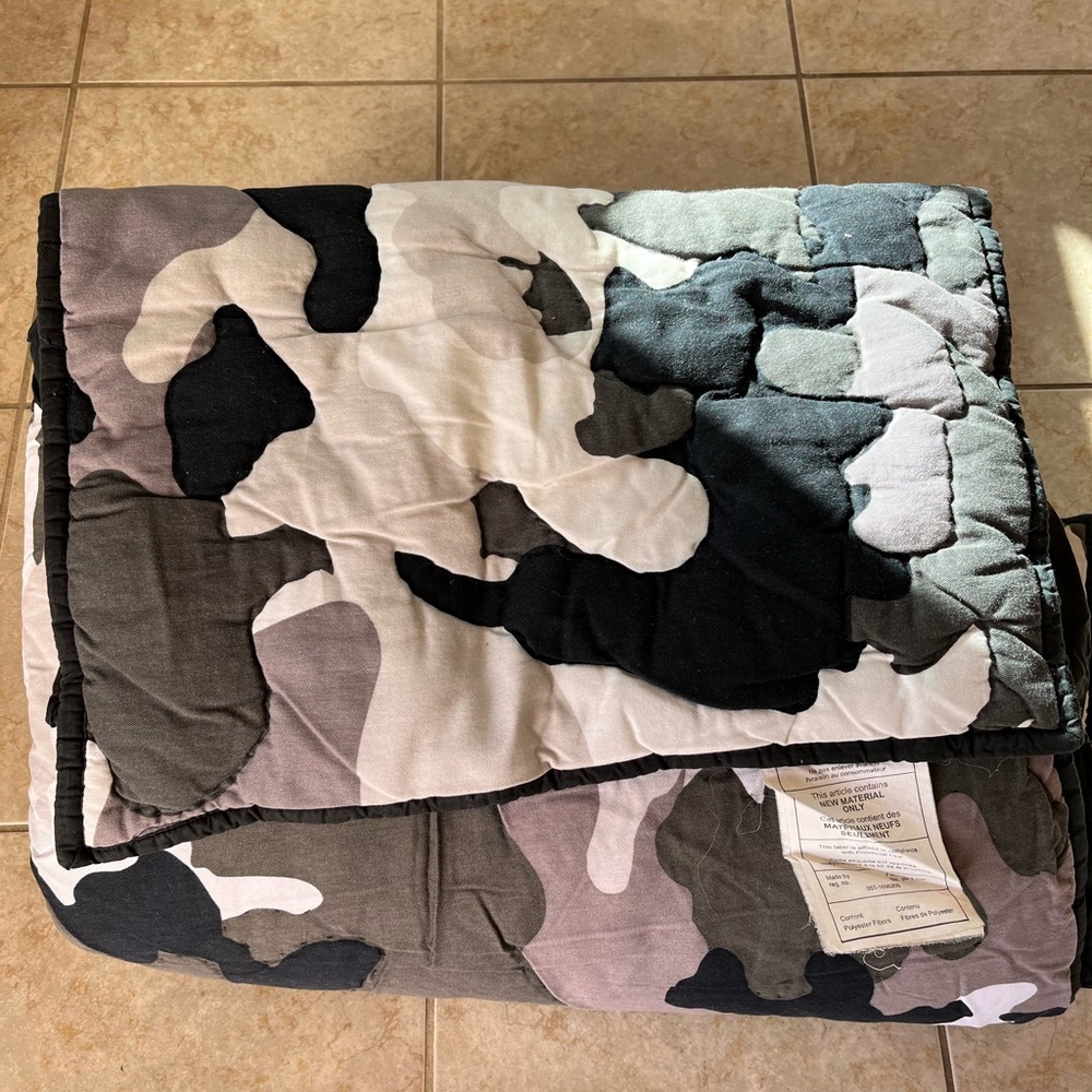 It is from pottery barn like new.It includes one comforter and one sham.